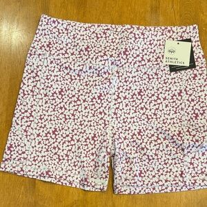 Senita Athletics Floral Pink & White Athletic Baseline 3 inch Shorts pockets